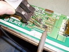 Photo unsoldering electronic components